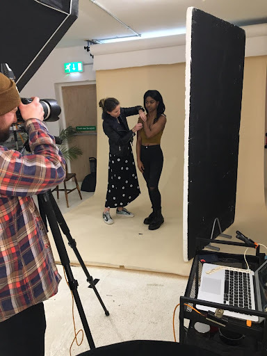 Stephanie working at_a photo shoot with_models